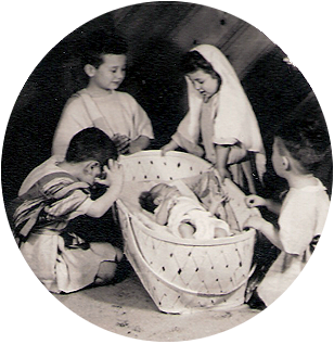 Elizabeth and her siblings in their childhood Christmas Nativity
